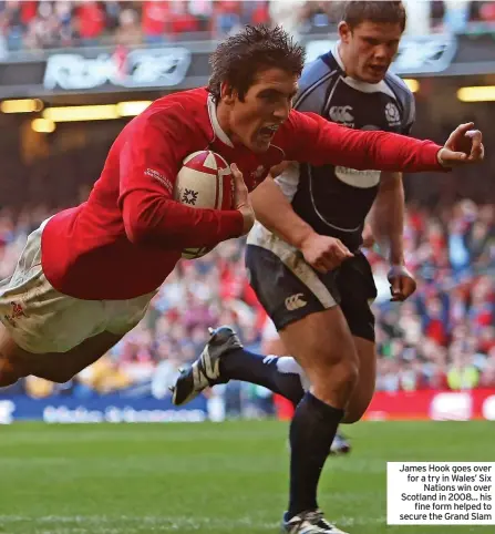  ?? ?? James Hook goes over for a try in Wales’ Six Nations win over Scotland in 2008... his fine form helped to secure the Grand Slam