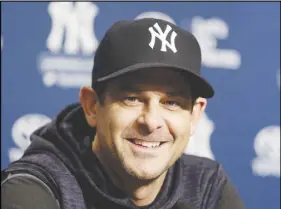  ?? AP PHOTO ?? Yankees manager Aaron Boone speaks to reporters before the scheduled New York Yankees home opener against the Tampa Bay Rays at Yankee Stadium.