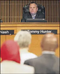  ?? HENRY TAYLOR / HENRY.TAYLOR@AJC.COM ?? Commission­er Tommy Hunter did not responded to an ethics complaint filed against him for the second time. His spokesman, Seth Weathers, calls the claims “unconstitu­tional.”