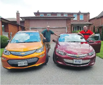  ??  ?? Brian Harper with the Chevrolet Bolt, left, and his brother Rick with the Chevrolet Volt.