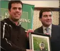  ??  ?? Minister Griffin presents Brendan O’Sullivan with a framed photo