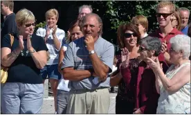  ?? MEDIANEWS GROUP FILE PHOTO ?? Lansdale Parks and Recreation Director Carl Saldutti, center, is applauded by friends and family as Saldutti was given the group’s Lansdale Lifetime Achievemen­t Award in August 2013. Saldutti died in 2018.