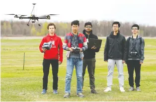  ??  ?? McGill AERO drone club members Alex Gouyet, left, Adrian Wang, Gohar Saqib Fazal, Mario Yao and Jiahua Liang prepared for a major student competitio­n by practising on an Île-Perrot airstrip surrounded by open fields.