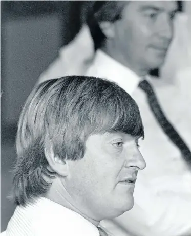  ?? Picture: Catherine Ross ?? Whitey Basson, then MD of Shoprite, on April 25 1991. Basson steered the company for nearly 40 years before retiring two years ago. Behind him is Tony Houghton, then Group MD of PEP.