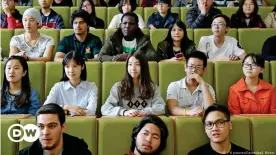  ??  ?? Students from many countries, including those from Asia, sit at a lecture hall at a university in Zwickau, Saxony