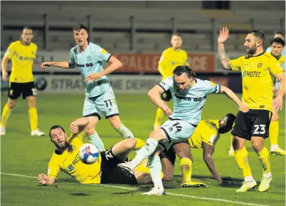  ?? Richard Burley/Epic Action Imagery ?? ●●Ollie Rathbone unleashes a shot during Dale’s 1-0 win at Burton