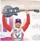  ?? TILTON/GETTY ?? Kyle Larson celebrates after winning the NASCAR Cup Series Ally 400 on Sunday. Jared C.