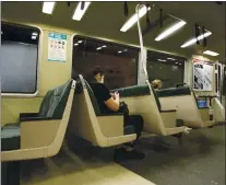  ?? KARL MONDON — STAFF ARCHIVES ?? Passengers ride a Daly City-bound BART train through San Francisco on June 24.
