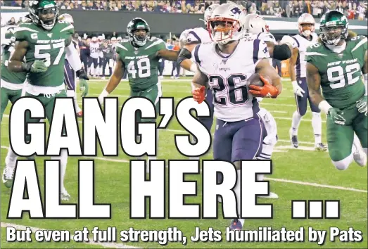  ?? AP ?? SONY WAS ELECTRIC: New England running back Sony Michel waltzed into the end zone on the first drive of the game Monday night, with Jets defenders, from left, C.J. Mosley, Jordan Jenkins and Leonard Williams looking on. Michel had three touchdowns in the game.