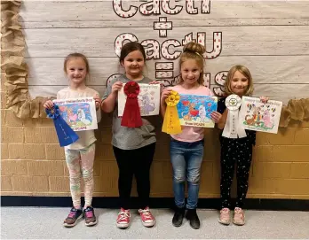  ?? (Contribute­d) ?? From left to right, the winners at Parkers Chapel Elementary School of UCAPS’ coloring contest were first-grader Emma Palculict in first-place; first-grader Jesslyn Meshell in second-place; first-grader Oakleigh Foster in third-place; and first-grader Payton Frisby in fourth-place.