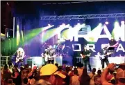  ??  ?? Country musician Craig Morgan, this year’s Honeybee Festival headliner, and his band took to the stage about 9:30 p.m. to perform in front of the what many believe was the largest outdoor crowd in LaFayette since the August 1970 Johnny Cash concert....