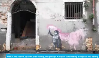  ??  ?? VENICE: The artwork by street artist Banksy, that portrays a migrant child wearing a lifejacket and holding a neon pink flare, is pictured after an exceptiona­l overnight “Alta Acqua” high tide water level. —AFP