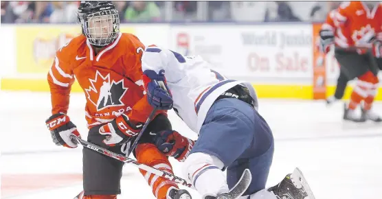  ?? ERNEST DOROSZUK ?? Canadian forward Meghan Agosta, left, battled Team USA’s Jocelyne Lamoureux in a recent friendly series and will play in her fourth Olympic tournament in February.