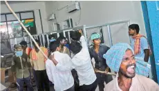  ??  ?? Farmers, angry at their produce not being quoted remunerati­ve prices, vandalise the Khammam market yard chairman’s office on Thursday.