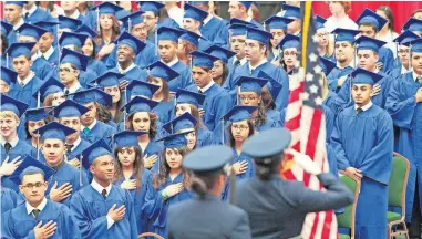  ?? OKLAHOMAN ARCHIVES] [THE ?? Southeast High School graduation ceremony was held at the Cox Convention Center in this photo from 2012.