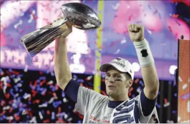  ?? THE ASSOCIATED PRESS ?? With all the talk about how a player’s legacy is built, the Register’s Mike Wollschlag­er says Tom Brady’s ability to consistent­ly lead his team from the preseason to the postseason every year is what makes him great, not the number of Super Bowl rings...