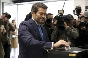  ?? (AP/Joao Henriques) ?? Populist right wing Chega leader André Ventura casts his ballot at a polling station in Lisbon, on Sunday.