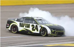  ?? Tribune News Service/las Vegas Review-journal ?? Driver William Byron does a burnout after winning the Pennzoil 400 NASCAR Cup Series race at Las Vegas Motor Speedway on Sunday in Las Vegas.