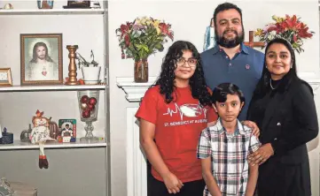  ?? STU BOYD II/THE COMMERCIAL APPEAL, USA TODAY NETWORK ?? Christian Rivera and Siria López fled Honduras from gang violence with their children, Krissia Rivera and Diego Rivera and found a better life in Memphis.