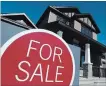  ?? SEAN KILPATRICK THE CANADIAN PRESS ?? CMHC says it sees vulnerabil­ity as imbalances in the housing market.