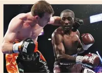  ??  ?? JEFF HORN (L) and Terence Crawford battle in the ninth round of their WBO welterweig­ht title fight at MGM Grand Garden Arena on June 9 in Las Vegas, Nevada.