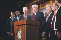  ?? TOM BRENNER / THE NEW YORK TIMES ?? Senate Majority Leader Mitch Mcconnell, R-KY., speaks alongside fellow Republican­s after the Senate passed the Republican tax bill on Capitol Hill in Washington. There never was, in the minds of Republican leaders, doubt the tax bill would pass — not...