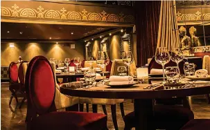  ?? ?? Fine dining: The opulent Varanasi restaurant in Birmingham – which can seat 350 – and a dish from the menu