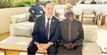  ?? PHOTO: State House ?? President Bola Tinubu shares thoughts with the Prime Minister of the Netherland­s, H.E. Mark Rutte, ahead of the Opening Session of the World Climate Action Summit in Dubai, United Arab Emirates