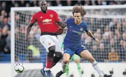  ?? /GETTY IMAGES ?? Man United’s Romelu Lukaku and Chelsea’s David Luiz during their Premier League at the weekend.
