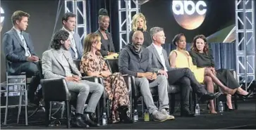  ?? Frederick M. Brown Getty Images ?? CAST MEMBERS and execs of “American Crime,” from rear left: Connor Jessup, Benito Martinez, Mickaëlle X. Bizet, Ana Mulvoy-Ten; bottom left, Richard Cabral, Felicity Huffman, John Ridley, Michael J. McDonald, Regina King and Lili Taylor. “We’re not as...
