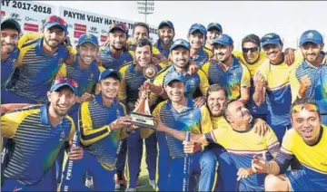  ?? PTI ?? Karnataka players pose after winning the Vijay Hazare final against Saurashtra by 41 runs at Ferozeshah Kotla on Tuesday.