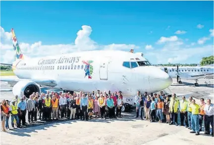  ?? CONTRIBUTE­D ?? The team at Cayman Airways