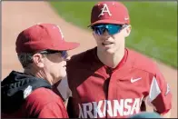  ?? NWA Democrat-Gazette/ANDY SHUPE ?? Arkansas second baseman Carson Shaddy (right) talks with Coach Dave Van Horn before the Razorbacks’ game with Dayton on March 1. After playing eight games on the road since March 17, Arkansas returns home today to play Louisiana-Monroe.