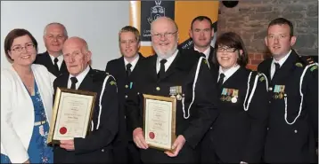  ??  ?? Civil Defence Civic Award recipients James Neary and Tony Duffy with Cllr. Maeve Yore and members of Louth Civil Defence at the inaugural Civic Awards Presentati­on Ceremony held in the County Museum.