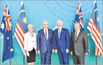  ??  ?? Najib and Turnbull in a photo call with their respective Foreign Ministers Julie Bishop and Datuk Seri Anifah Aman.
