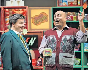  ??  ?? Stinking rich: Matthew Gordon as rich kid Joe Spud and Aosaf Afzal as comic shopkeeper Raj