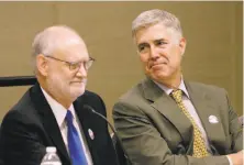  ?? Jeff Chiu / Associated Press ?? Supreme Court Justice Neil Gorsuch (right) is a panelist with Ninth Circuit Court of Appeals Chief Judge Sidney Thomas.