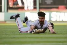  ?? Joe Puetz / Associated Press ?? Giants outfielder LaMonte Wade Jr. was put on the IL after his knee flared up while running the bases Monday in Colorado.