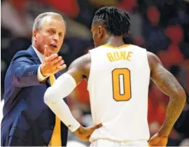  ?? AP FILE PHOTO/WADE PAYNE ?? Tennessee men’s basketball coach Rick Barnes talks with guard Jordan Bone during the game against Georgia Tech on Nov. 13. The Vols play No. 1 Gonzaga today.