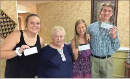  ??  ?? STUDENTS RECEIVE $500 SCHOLARSHI­PS: The Friendly River Homemaker Club selects four graduating students to each receive a $500 Stewart-Johnston Memorial Scholarshi­p. From left are Kayleigh Carney, Armuchee; Marie Carney, club president; Erin Carney,...