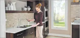  ?? BRANDPOINT ?? The kitchen is comprised of your three main work areas: the stovetop, refrigerat­or and sink. This triangle should provide enough space to move around but not be so large that cooking is difficult.