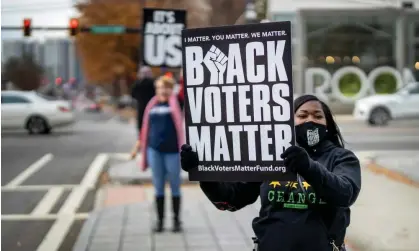  ?? Photograph: Erik S Lesser/EPA ?? Protesters in Atlanta, Georgia, urge the US Senate to pass voting rights legislatio­n, December 2021.