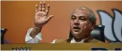  ?? — PTI ?? Union minister for agricultur­e & farmers welfare Narendra Singh Tomar addresses a press conference at BJP headquarte­rs in New Delhi on Thursday.