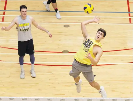  ?? DAX MELMER ?? The Windsor Lancers’ Pierce Johnson spikes the ball during practice at the Sportsplex on Thursday. The much improved team heads to Hamilton on Friday to play the No. 2 ranked McMaster Marauders in one of two semifinals matches.