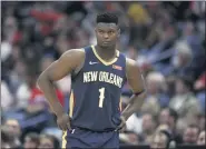  ?? RUSTY COSTANZA — THE ASSOCIATED PRESS ?? Pelicans forward Zion Williamson walks onto the court during a game against the Heat on March 6.