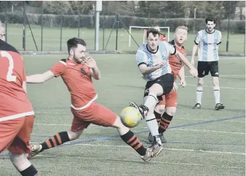  ??  ?? Action from Premiair Reserves’ (blue) win over Orton Rangers in a Peterborou­gh Minor Cup semi-final.