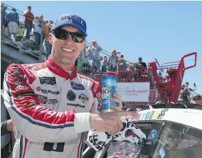  ?? GETTY IMAGES ?? Kevin Harvick, driver of the #4 Mobil 1 Ford, poses in victory lane after winning the Monster Energy NASCAR Cup Series Toyota/Save Mart 350 at Sonoma Raceway Sunday.