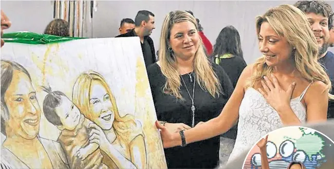  ?? MARCOS OTAÑO/MARIANA BASILIO ?? REGALO. El viernes un grupo de artistas de Misiones le entregó un retrato especial a la futura primera dama.