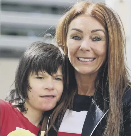  ??  ?? 0 Billy Caldwell with his mother Charlotte, who has won permission to treat her son’s epilepsy with medicinal cannabis