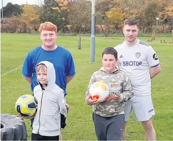  ??  ?? Great entries Kinrossie Caledonian players with Flynn and Charlie